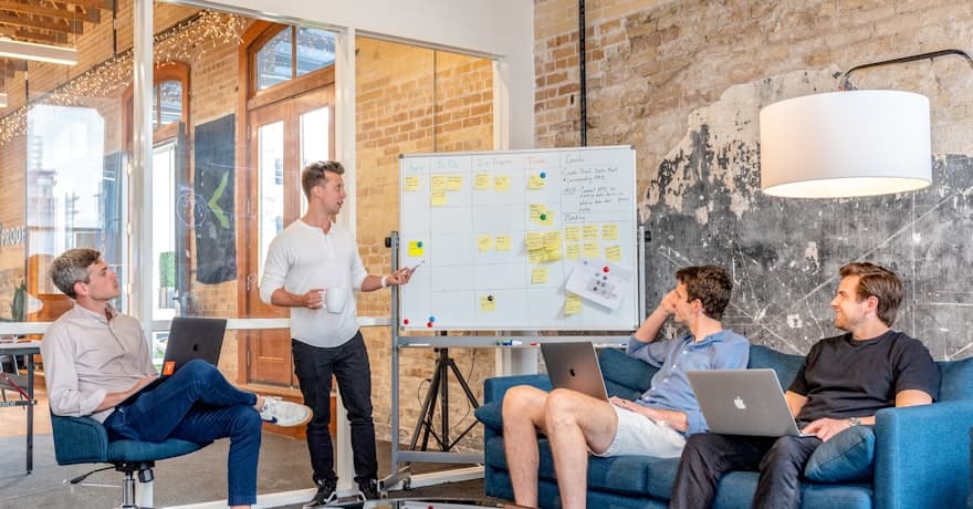 An agency team running through a campaign board together